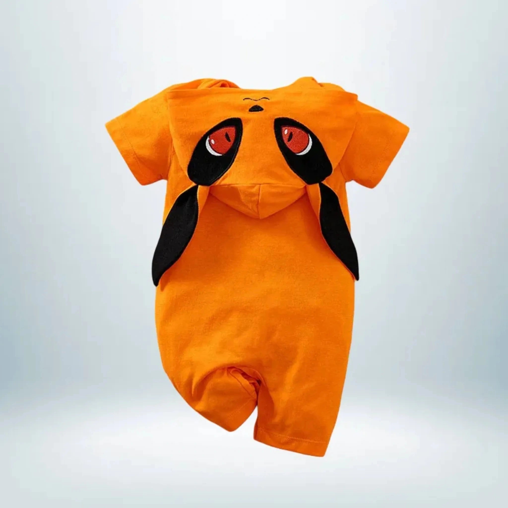 Dos du body Kurama bébé montrant les oreilles tombantes et l’orange vif du tissu.