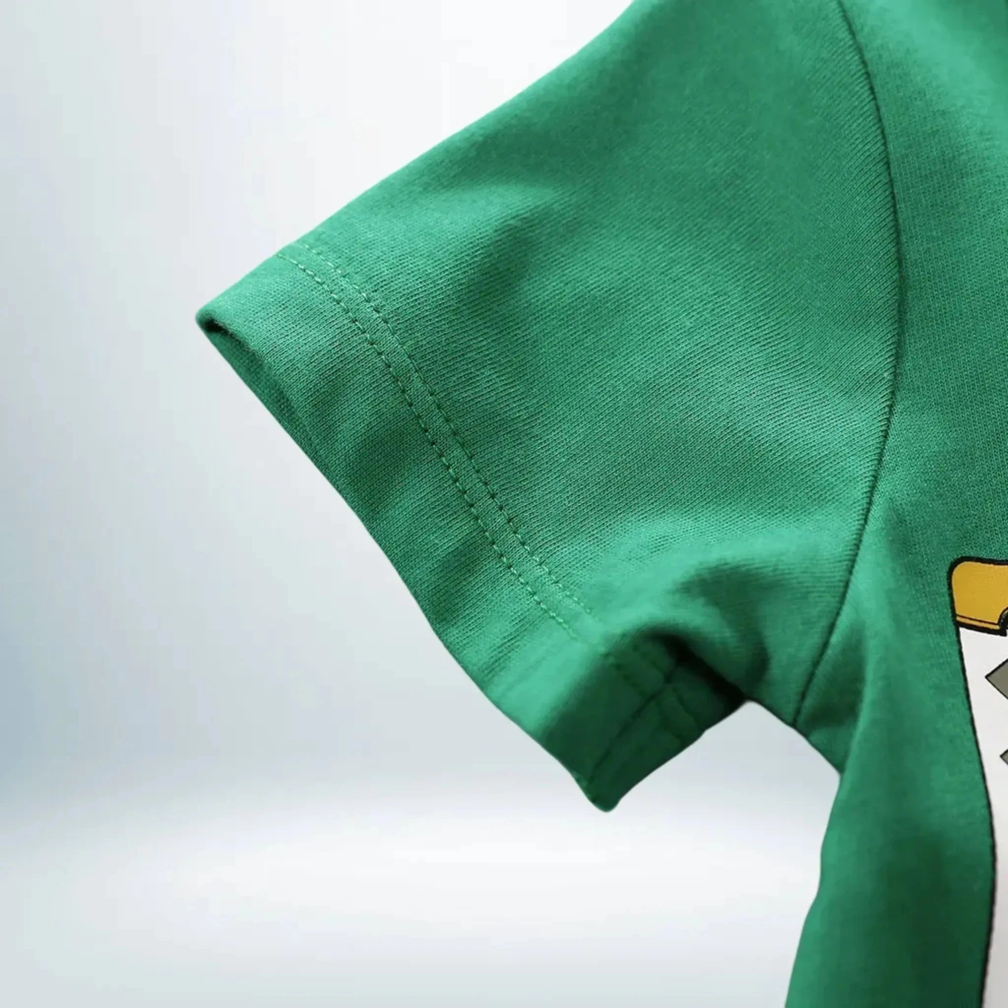 Manche courte verte du body Zoro pour bébé avec finitions soignées